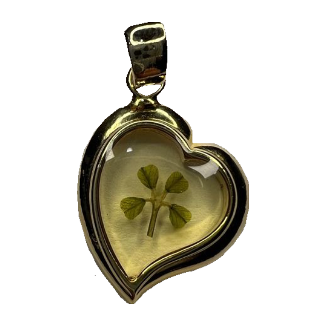 four leaf clover in a locket
